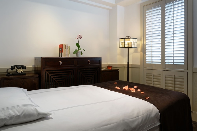 Imagen de la habitación del Hotel Relais and Chateaux Chaptel Hangzhou. Foto 6