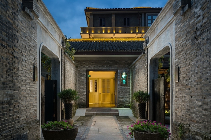 Imagen de los interiores del Hotel Relais and Chateaux Chaptel Hangzhou. Foto 18