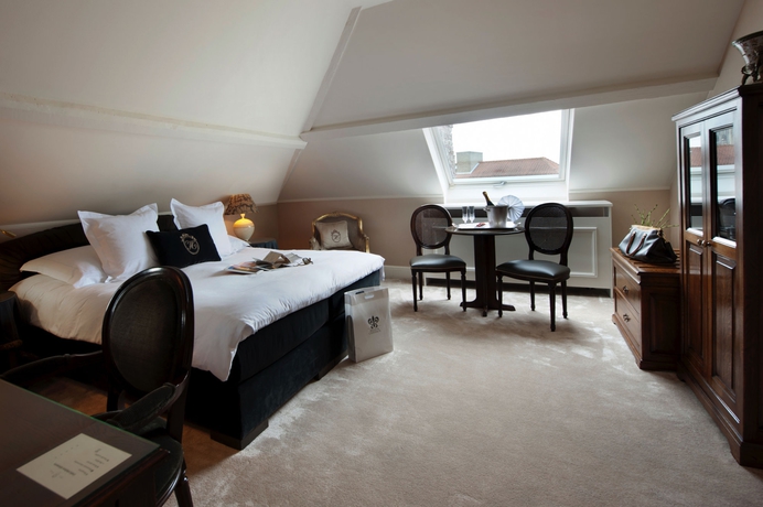 Imagen de la habitación del Hotel Relais and Chateaux Heritage. Foto 11