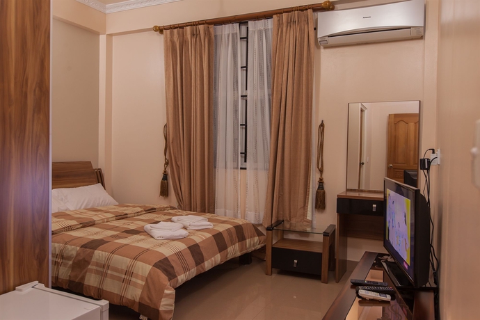 Imagen de la habitación del Hotel Relax Beach Inn. Foto 15