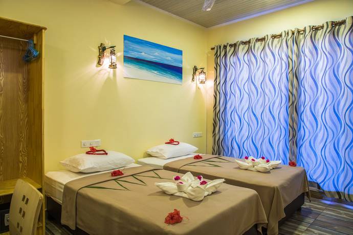Imagen de la habitación del Hotel Relax Residence Thoddoo Maldives. Foto 4