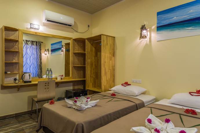 Imagen de la habitación del Hotel Relax Residence Thoddoo Maldives. Foto 6