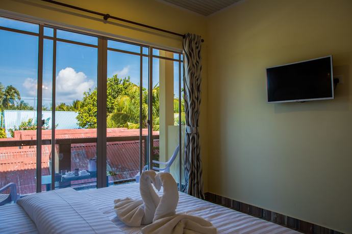 Imagen de la habitación del Hotel Relax Residence Thoddoo Maldives. Foto 7