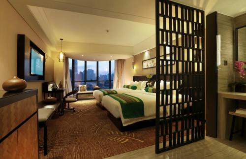 Imagen de la habitación del Hotel Relax Season Dongmen. Foto 4