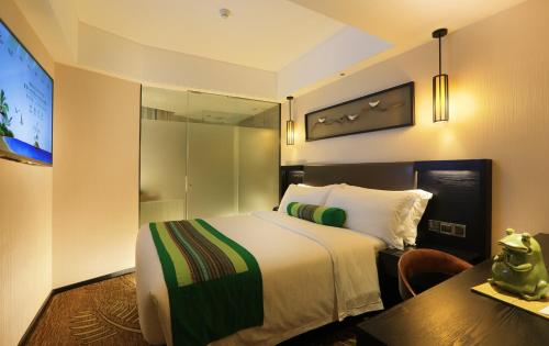 Imagen de la habitación del Hotel Relax Season Dongmen. Foto 5