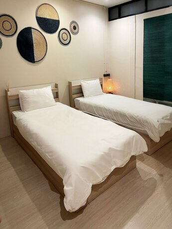 Imagen de la habitación del Hotel Rema, Bangkok. Foto 16