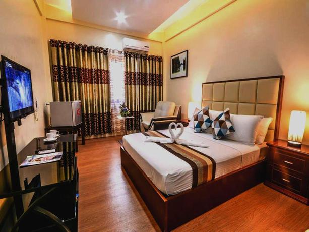 Imagen de la habitación del Hotel Rema Tourist Inn. Foto 2