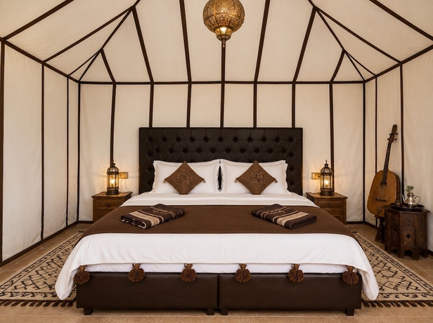 Imagen de la habitación del Hotel Remal Luxury Camp. Foto 5