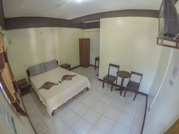Imagen de la habitación del Hotel Remari Tourist Inn. Foto 9
