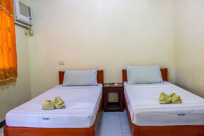 Imagen de la habitación del Hotel Remari Tourist Inn. Foto 10