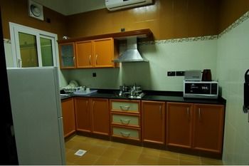 Imagen de la habitación del Hotel Remas Suites. Foto 13