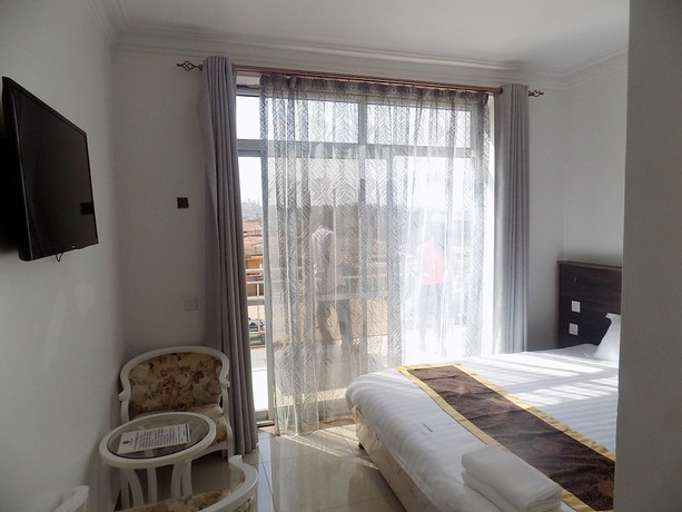 Imagen de la habitación del Hotel Remmings, Bwaise. Foto 16