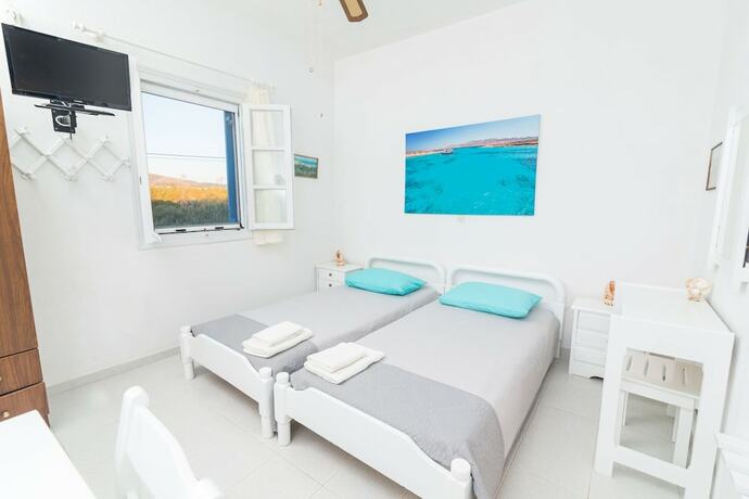 Imagen de la habitación del Hotel Remvi Studios. Foto 15