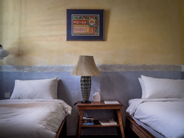 Imagen de la habitación del Hotel Ren I Tang. Foto 7