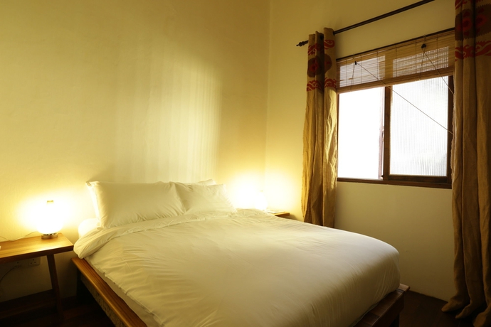 Imagen de la habitación del Hotel Ren I Tang. Foto 12