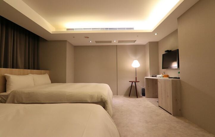 Imagen de la habitación del Hotel Ren Mei Fashion. Foto 14