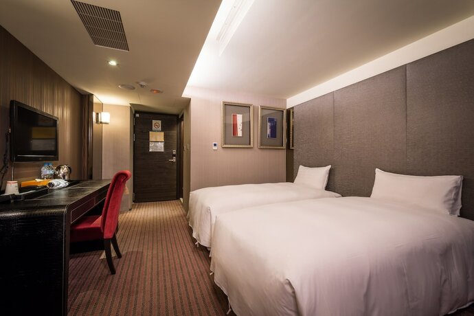 Imagen de la habitación del Hotel Ren Mei Fashion. Foto 16