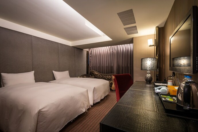 Imagen de la habitación del Hotel Ren Mei Fashion. Foto 18