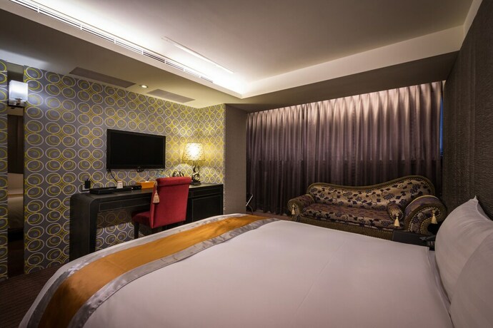 Imagen de la habitación del Hotel Ren Mei Fashion. Foto 19
