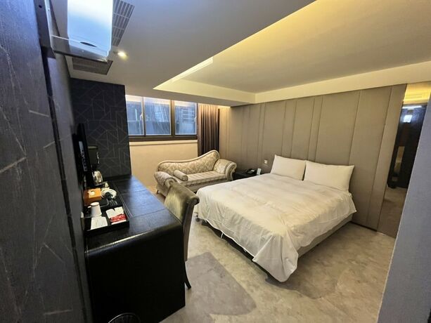 Imagen de la habitación del Hotel Ren Mei Fashion. Foto 20