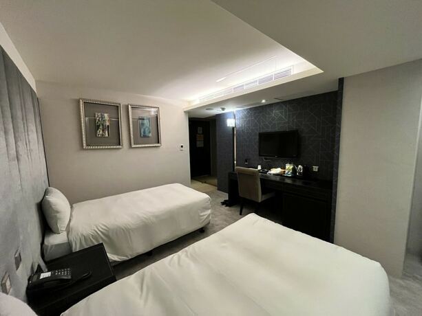 Imagen de la habitación del Hotel Ren Mei Fashion. Foto 22