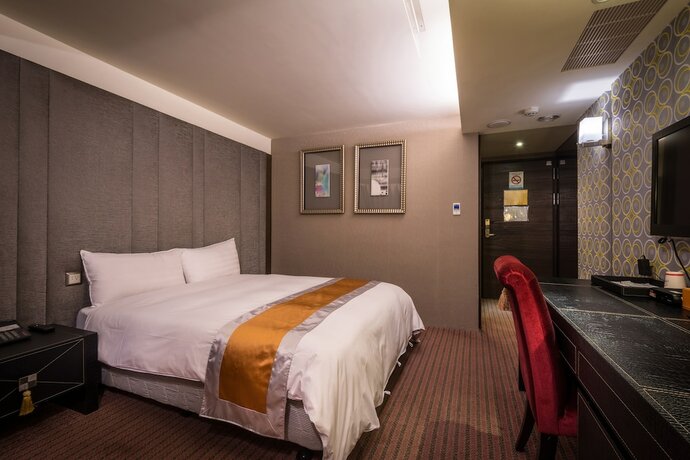 Imagen de la habitación del Hotel Ren Mei Fashion. Foto 27