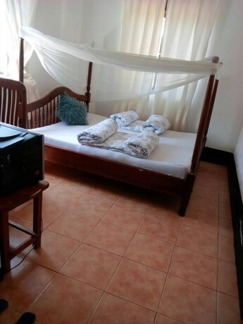 Imagen de la habitación del Hotel Rena Akasha Establishments. Foto 15
