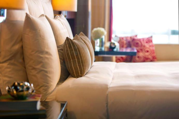 Imagen de la habitación del Hotel Renaissance Beijing Capital. Foto 12