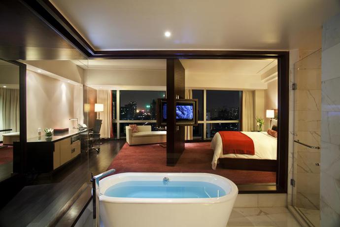 Imagen de la habitación del Hotel Renaissance Beijing Capital. Foto 15