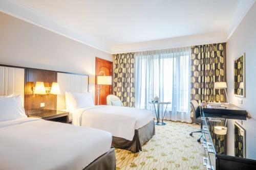 Imagen de la habitación del Hotel Renaissance Brussels. Foto 12