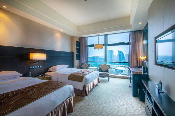 Imagen de la habitación del Hotel Renaissance Guiyang. Foto 11