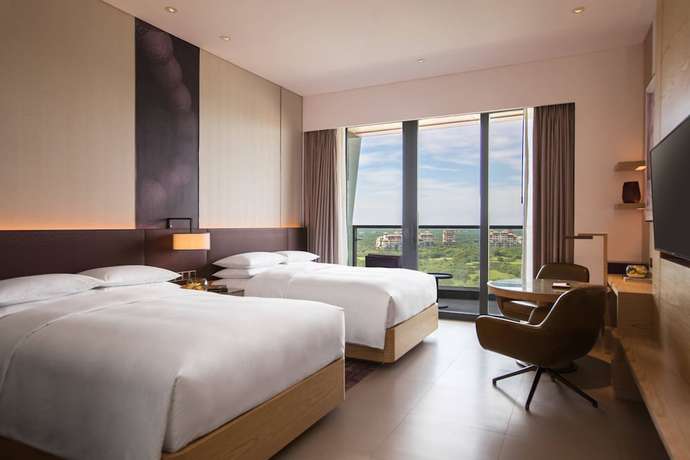 Imagen de la habitación del Hotel Renaissance Haikou. Foto 13