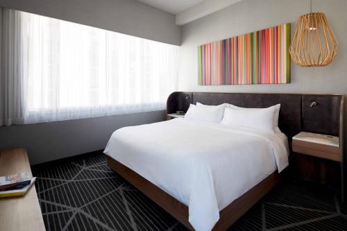 Imagen de la habitación del Hotel Renaissance Montreal Downtown. Foto 18