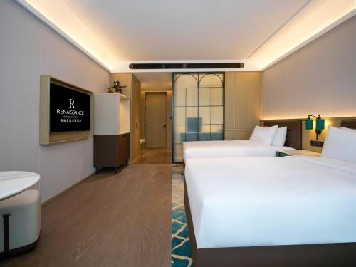 Imagen de la habitación del Hotel Renaissance Qingdao. Foto 15