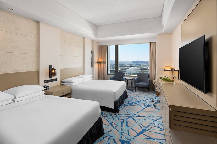 Imagen de la habitación del Hotel Renaissance Shanghai Caohejing. Foto 13