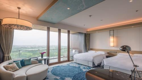 Imagen de la habitación del Hotel Renaissance Suzhou Taihu Lake. Foto 9