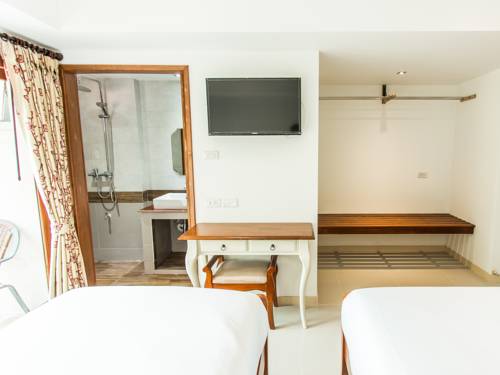 Imagen de la habitación del Hotel Rendezvous Classic House. Foto 16