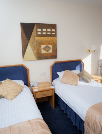 Imagen de la habitación del Hotel Rendezvous. Foto 9