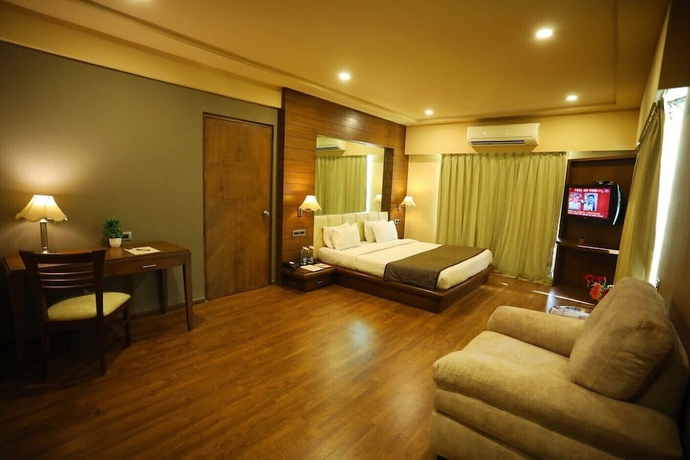 Imagen de la habitación del Hotel Renest Gandhidham. Foto 3