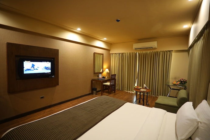 Imagen de la habitación del Hotel Renest Gandhidham. Foto 5