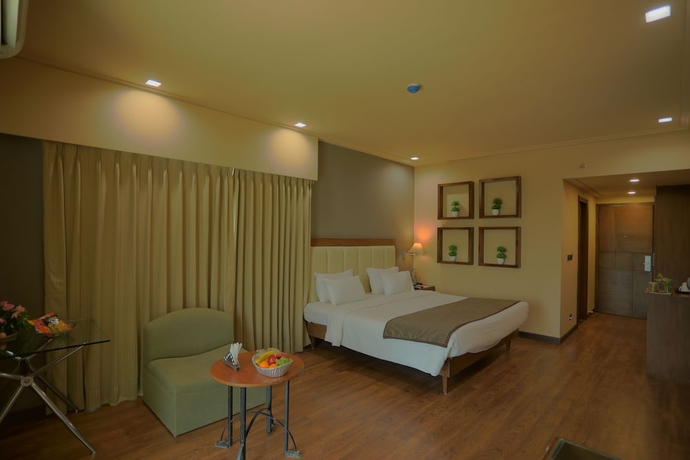 Imagen de la habitación del Hotel Renest Gandhidham. Foto 7