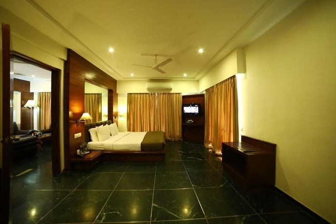 Imagen de la habitación del Hotel Renest Gandhidham. Foto 9