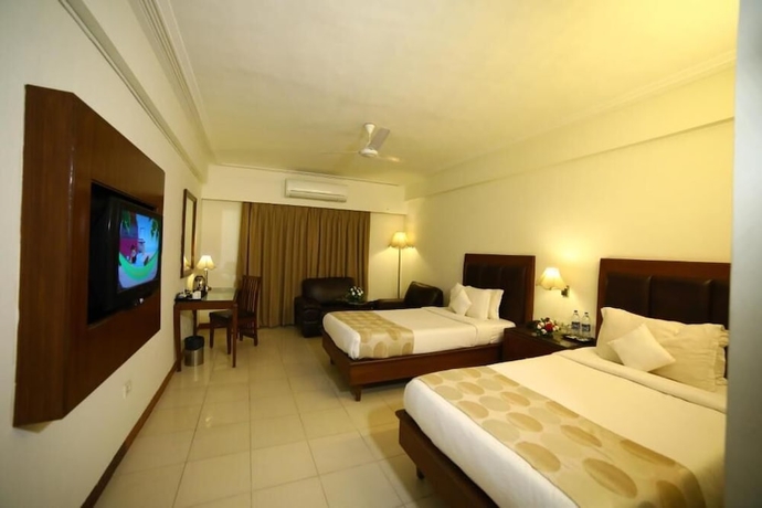Imagen de la habitación del Hotel Renest Gandhidham. Foto 10