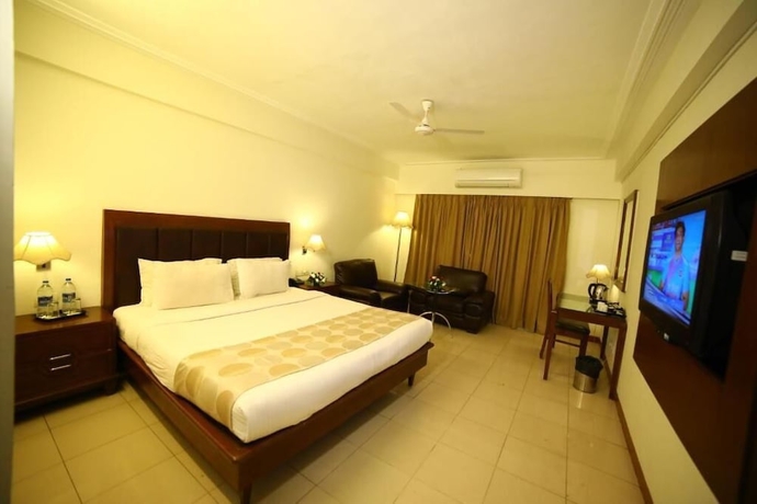 Imagen de la habitación del Hotel Renest Gandhidham. Foto 11