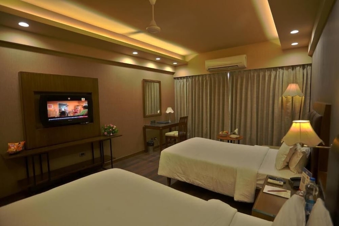 Imagen de la habitación del Hotel Renest Gandhidham. Foto 12