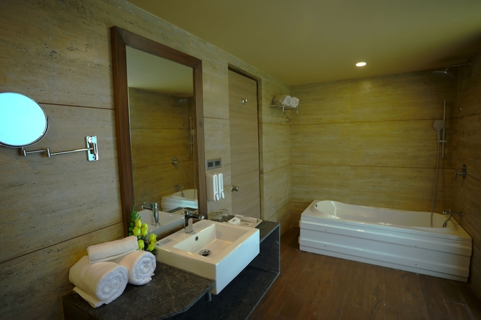 Imagen de la habitación del Hotel Renest Gandhidham. Foto 14