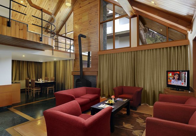 Imagen del bar/restaurante del Hotel Renest River Country Resort Manali. Foto 2