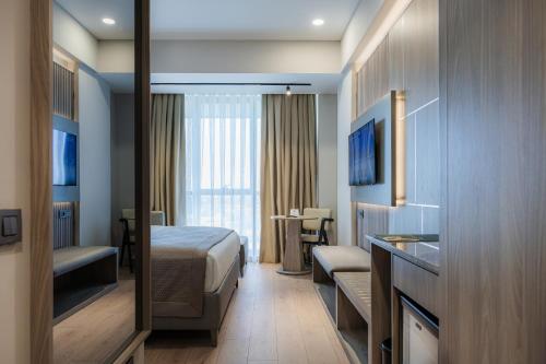 Imagen de la habitación del Hotel Renex Hotels. Foto 2