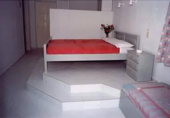 Imagen de la habitación del Hotel Renia Studios. Foto 9