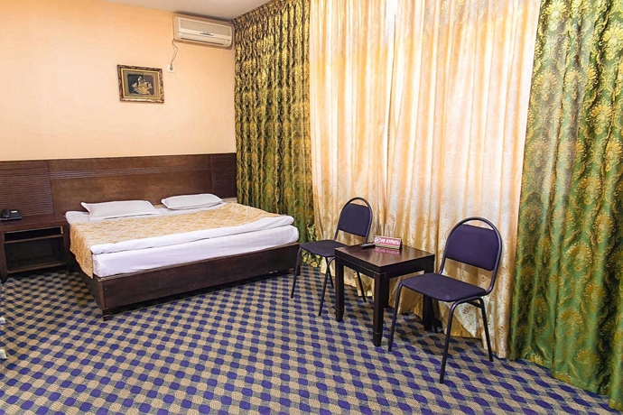 Imagen de la habitación del Hotel Renion Almaty. Foto 9